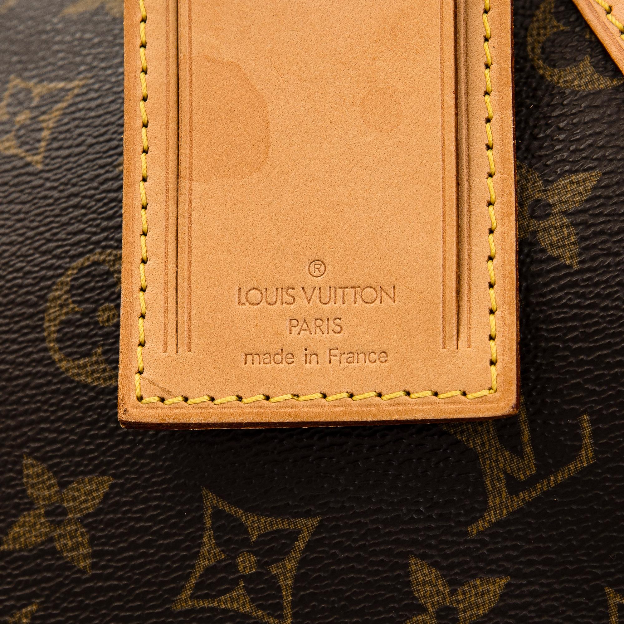 Louis Vuitton, a Monogram Canvas 'Keepall 55 Bandouliere' bag.