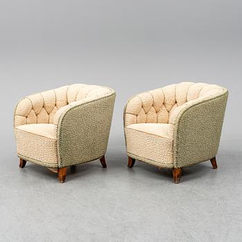 A pair of 1930s/1940s Swedish Modern easy chairs.