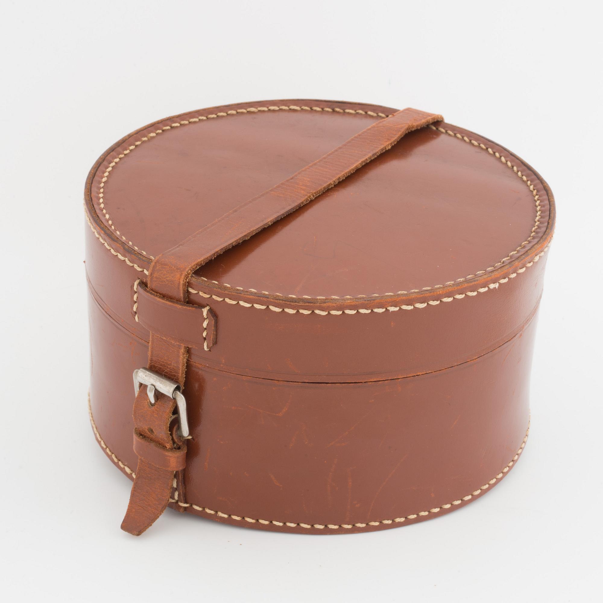 A silver belt buckle, three bracelets, two pairs of earrings, a pair of cuff-links and a brooch.