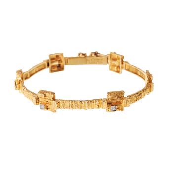 623. A Lapponia bracelet, 18k gold with six brilliant cut small diamonds, Finland 1976.