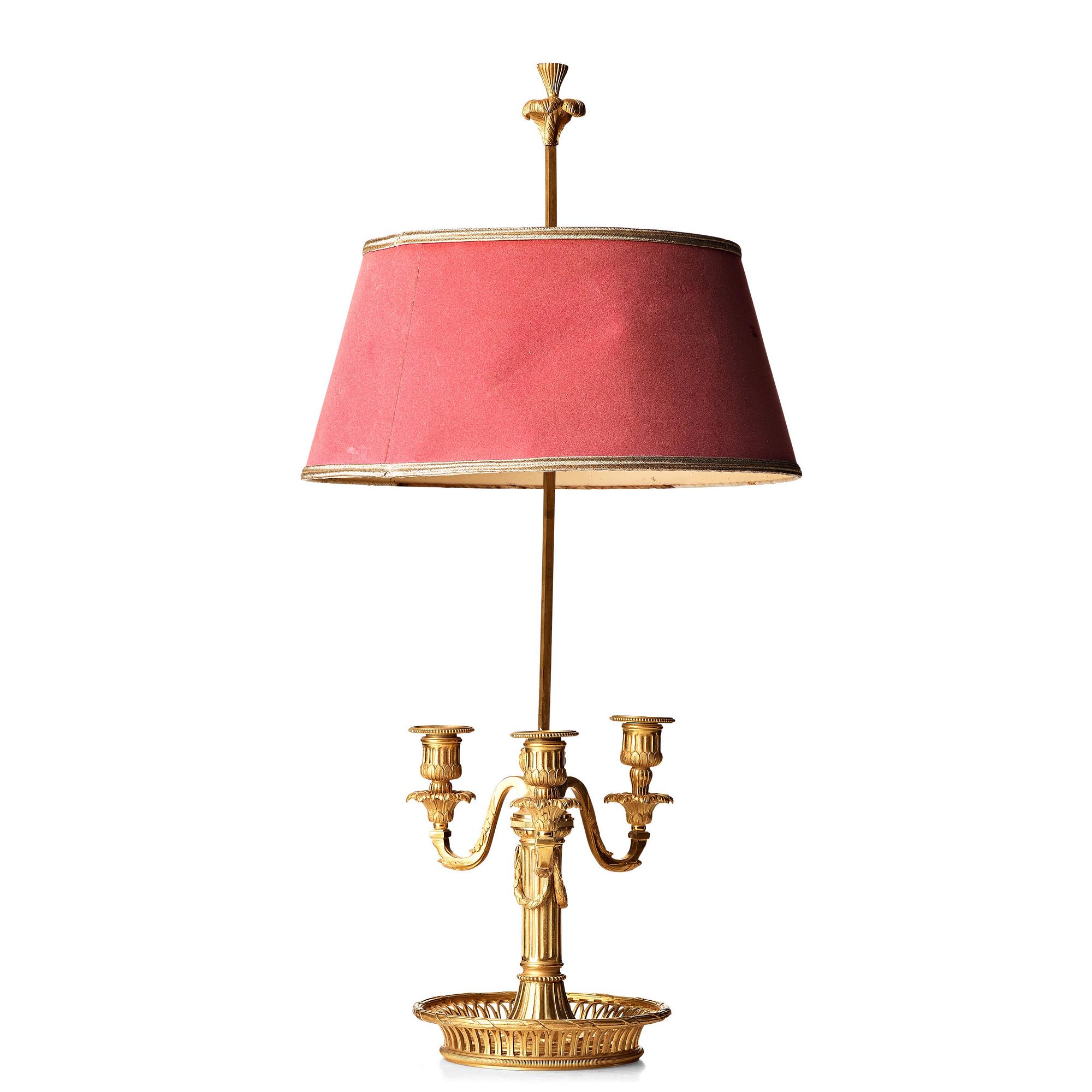 A Louis XVI-style LAMPE À BOUILLOTTE.