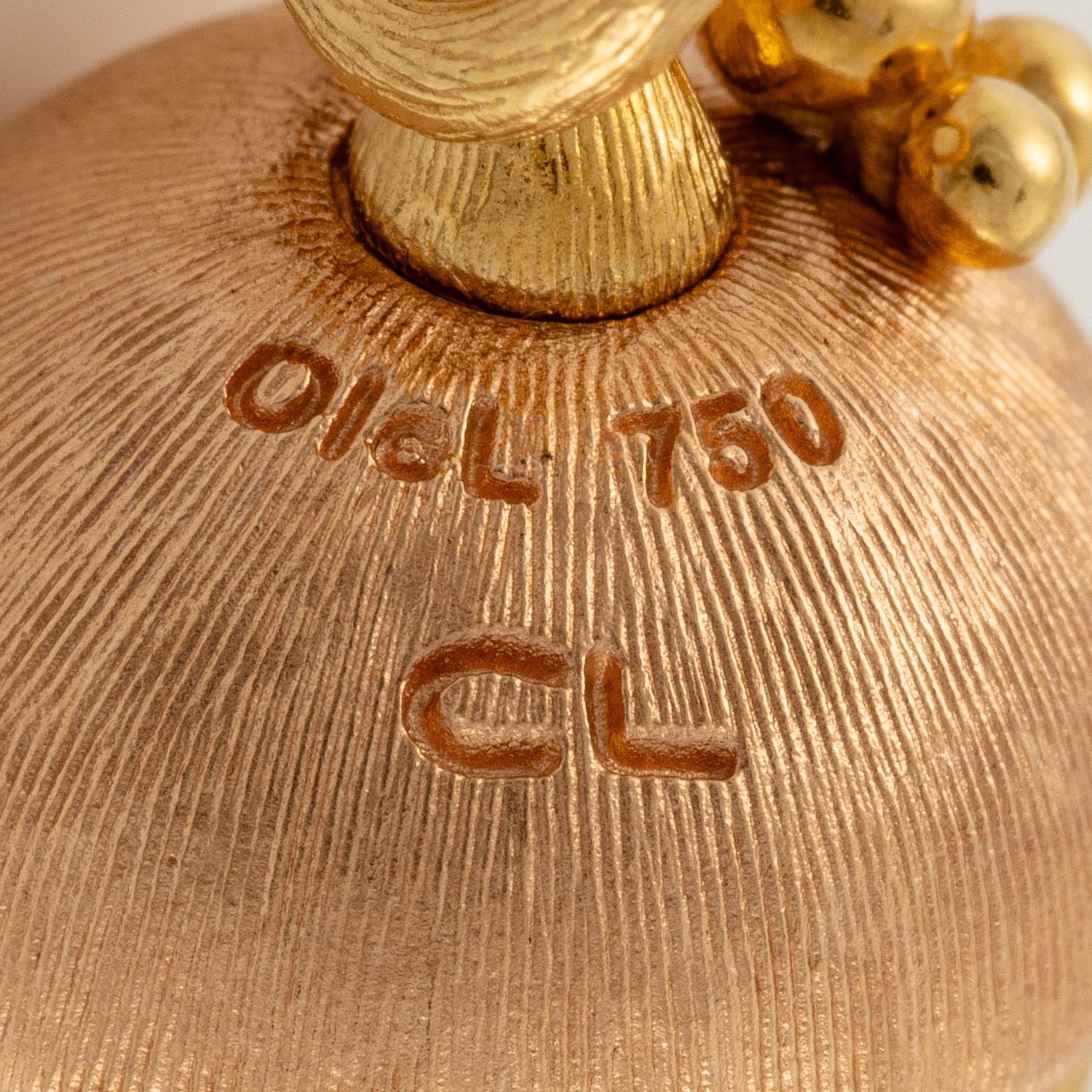 An Ole Lynggaard pendant in 18K gold in two colours with a round brilliant-cut, "Forest Pendant".