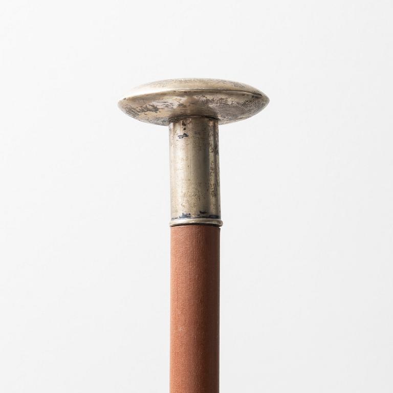 A wooden riding crop with silver mountes knob, 1929, Sweden, price from a horse jumping contest.