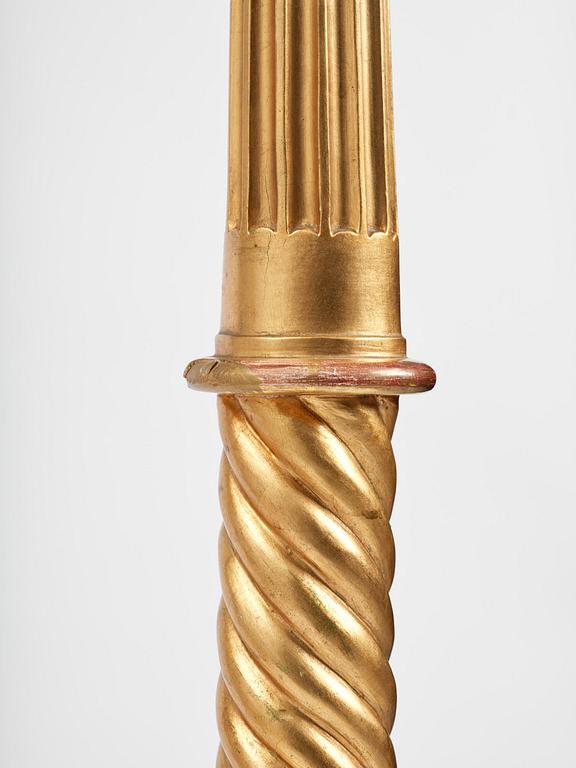 A pair of late Gustavian giltwood torchères by J. Frisk (master in Stockholm 1805-24).