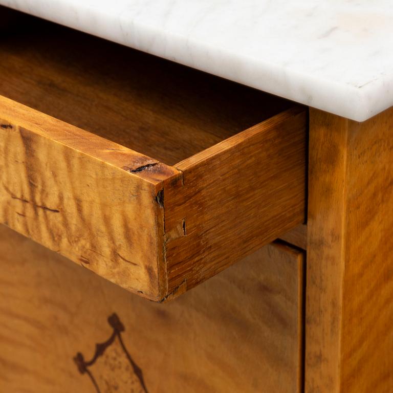 A pair of bedside tables from the first half of the 20th century.