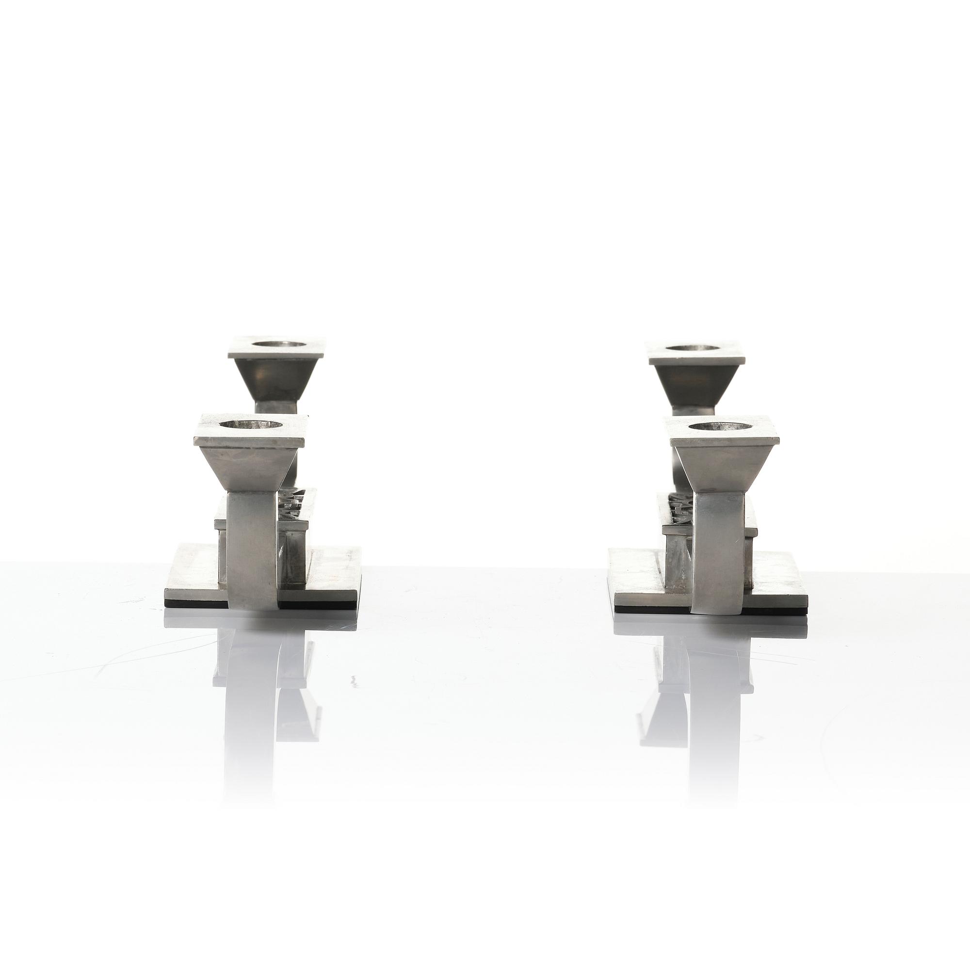 Guldsmedsaktiebolaget (GAB), a pair of candelabra model 117B/1, Stockholm, 1930s.