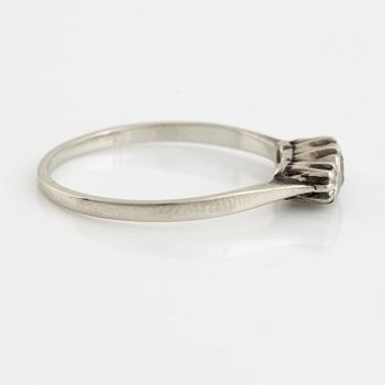 White gold and three brilliant cut diamond ring.