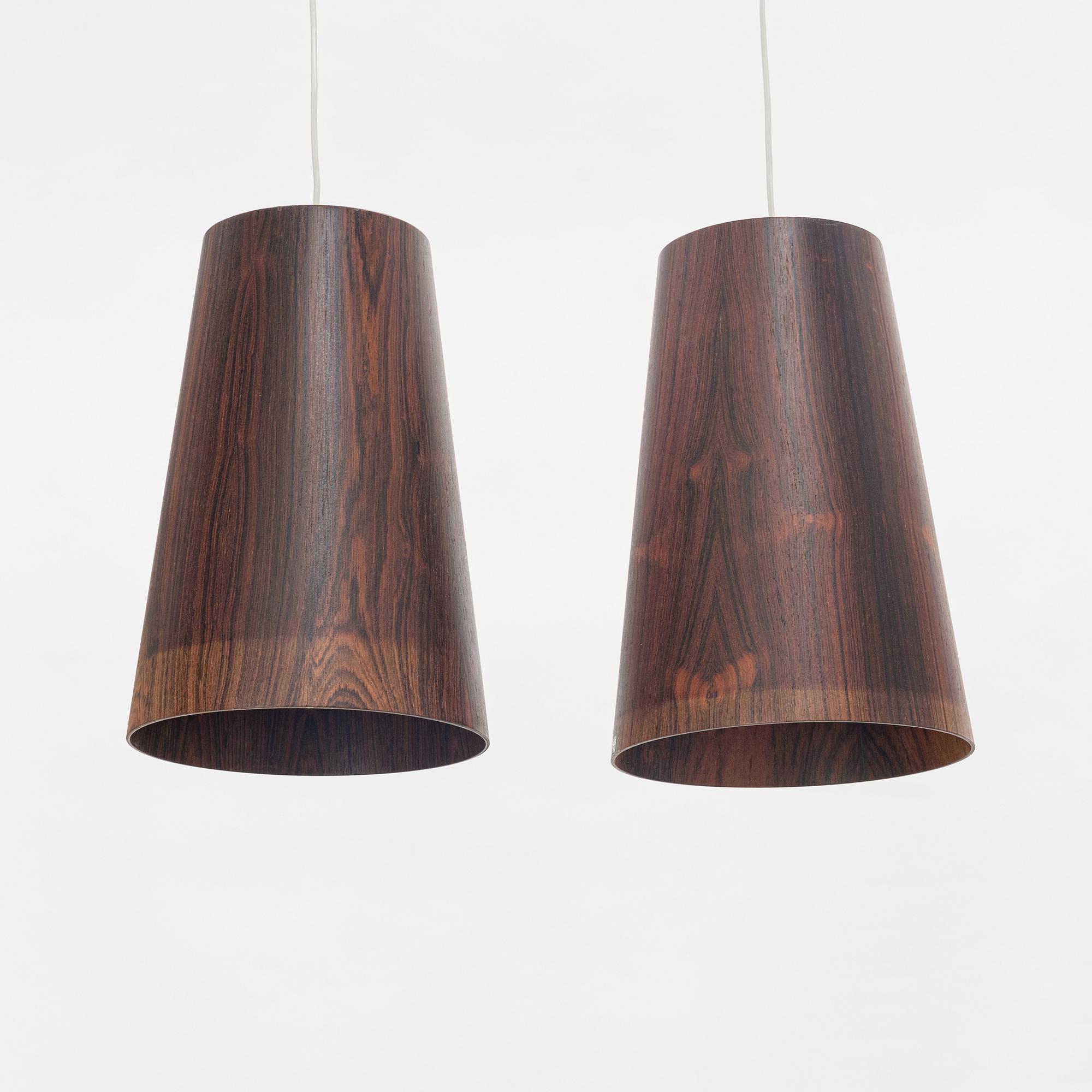 Uno & Östen Kristiansson, a pair of rosewood veneered model 506 ceiling lights, Luxus, Vittsjö, 1960's.