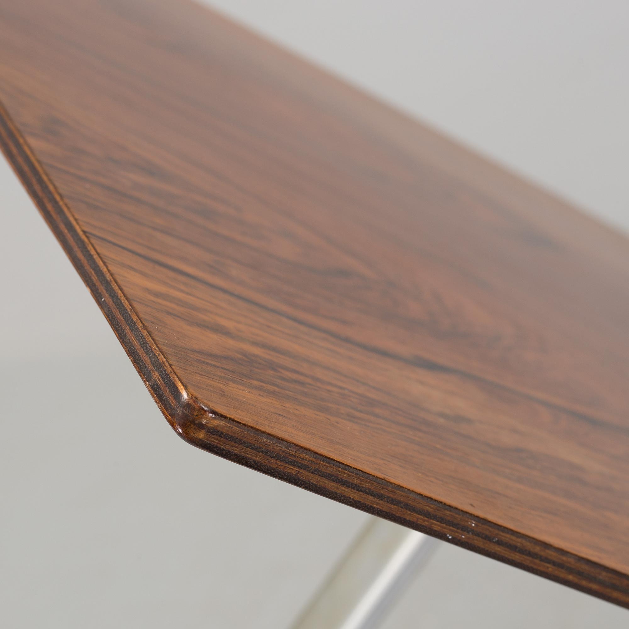 A rosewood top and aluminium coffee table, model 3315 by Fritz Hansen, Denmark 1968.