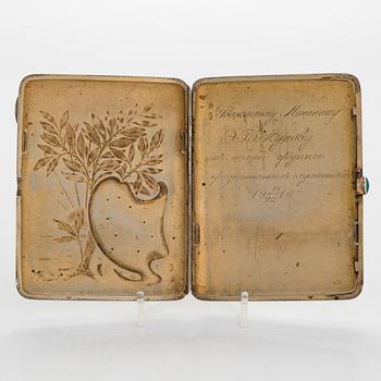 A silver cigarette case, Moscow, dated 1916.