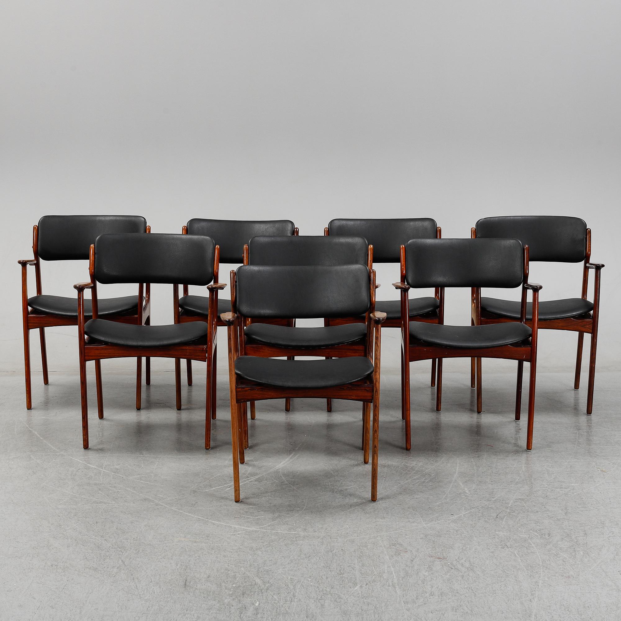 Eight rosewood armchairs by Erik Buch for Oddense Maskinsnedkeri A-S.