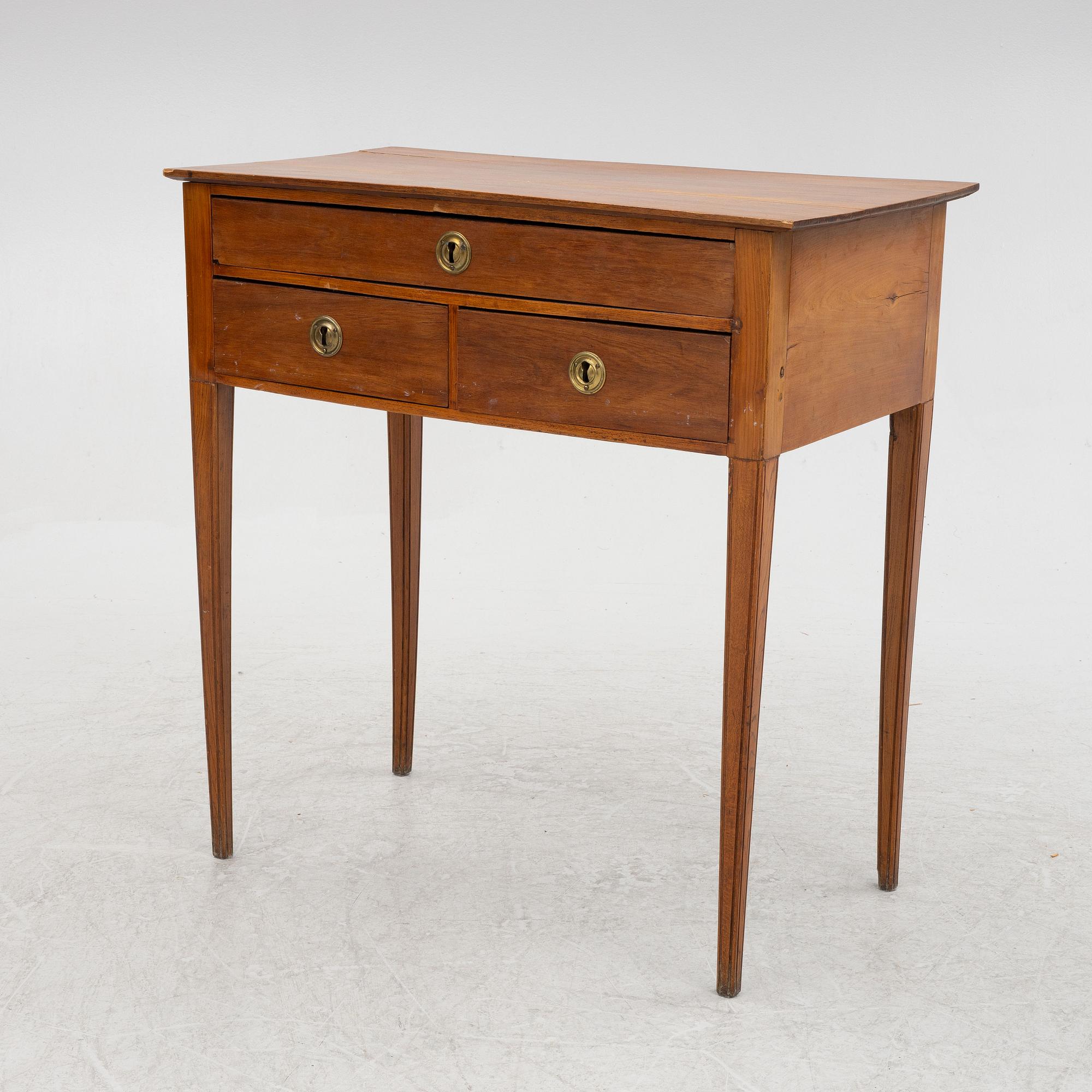 A side table with drawers, first half of the 19th century.