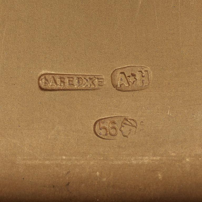 A Russian gold and dimond puder-box, marks of FABERGÈ and August Hollming, St. Petersburg early 20th century.