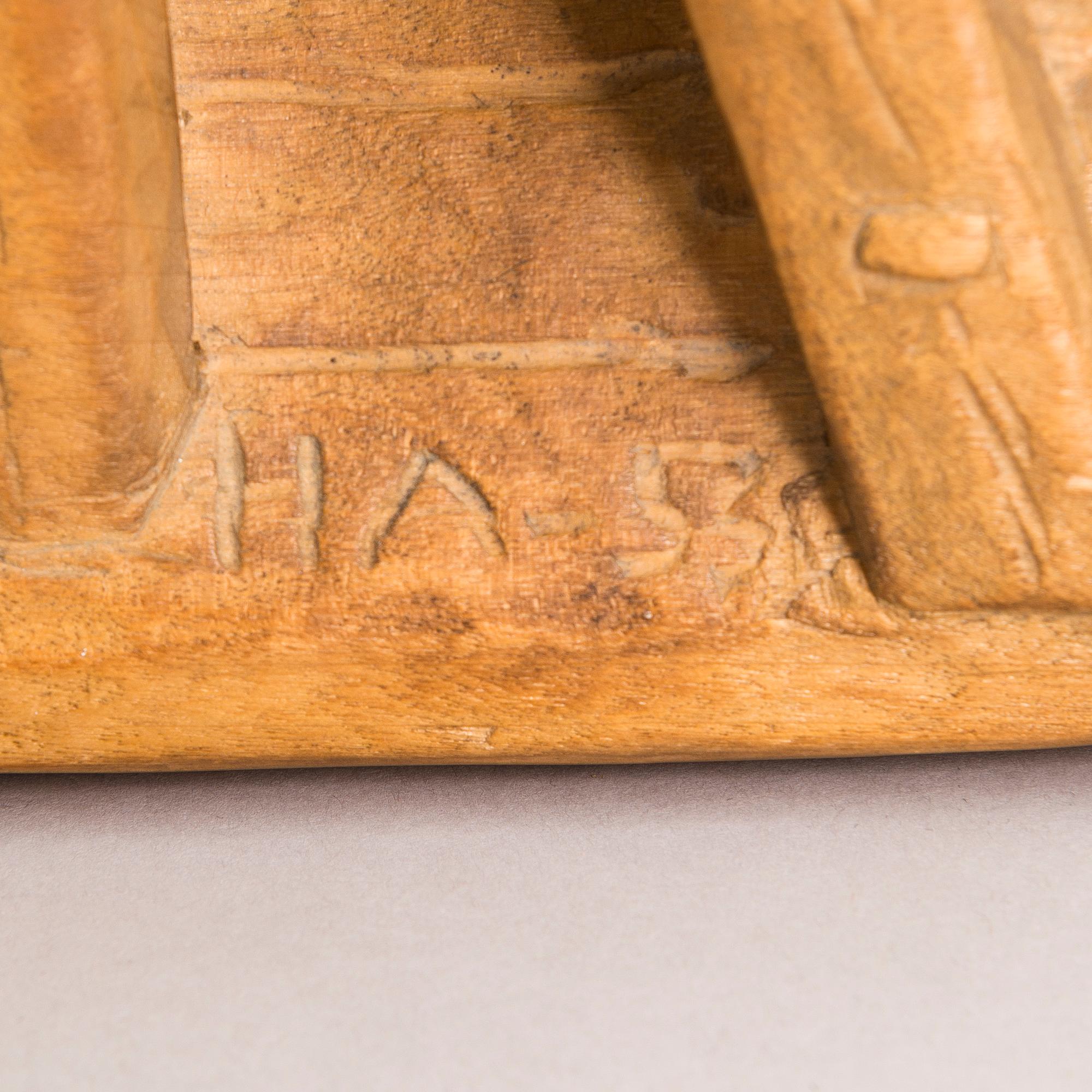 HANNES AUTERE, relief, wood, signed and dated 1955.