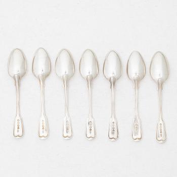 Seven silver spoons, French model, mostly William Comyns, London 1916.