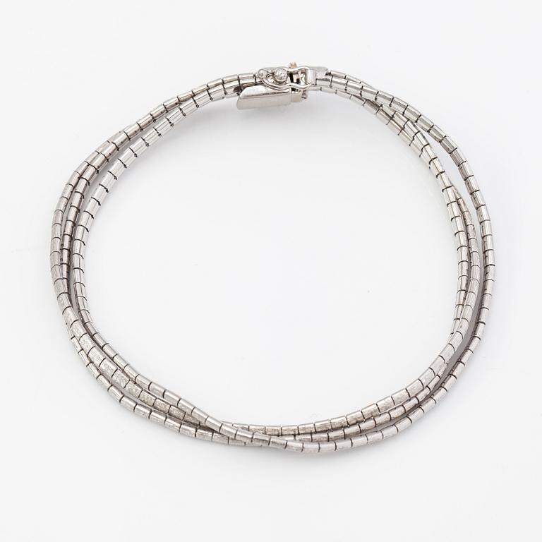 A 14K white gold bracelet. Import marked TIllander, Helsinki 1967.