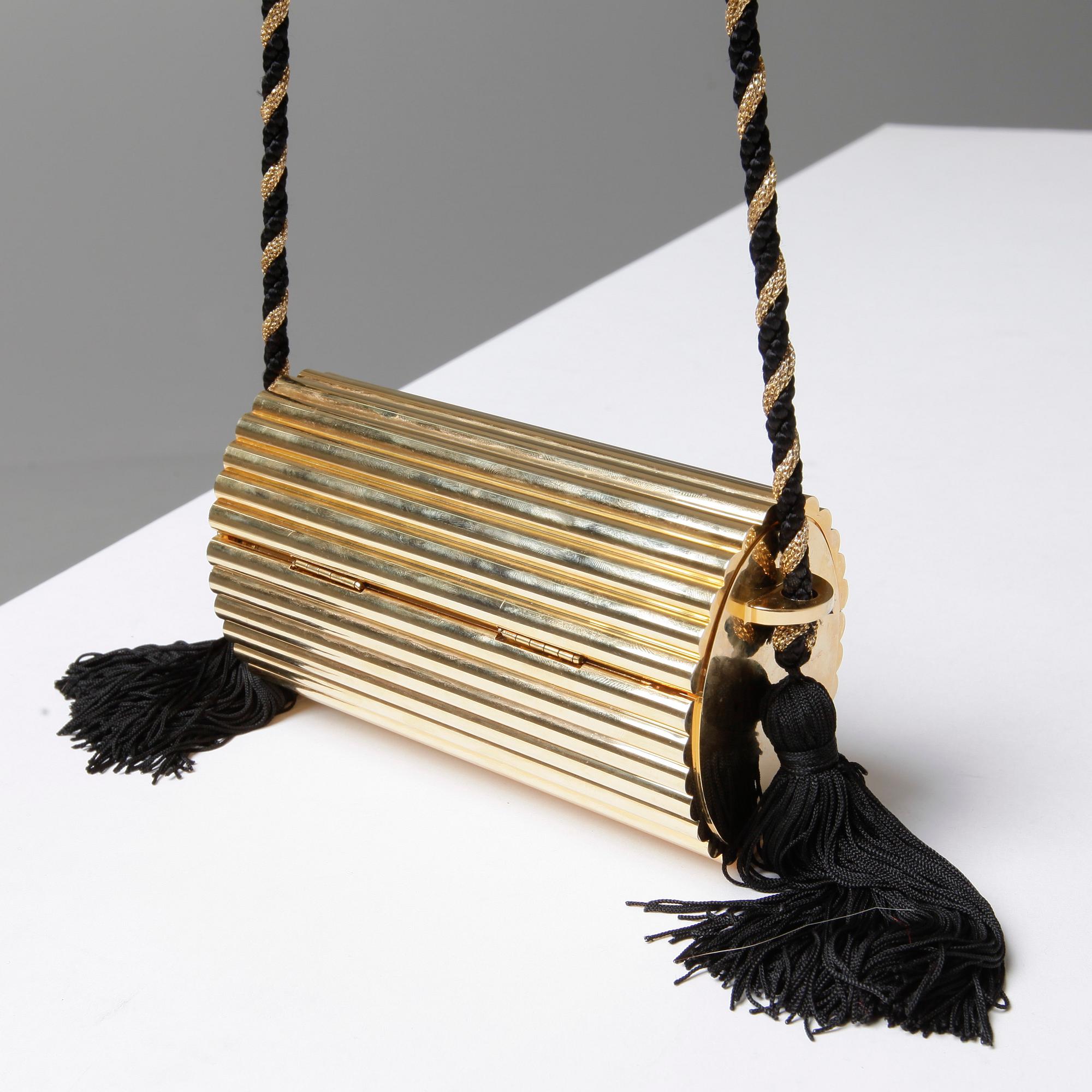 AFTONVÄSKA, "Gold Tassel Clutch", Yves Saint Laurent.