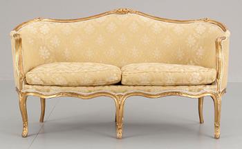 716. A Rococo 18th cent sofa.