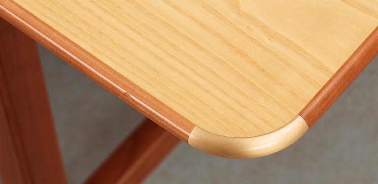 A Josef Frank ash and mahogany desk with brass fittings, by Svenskt Tenn.