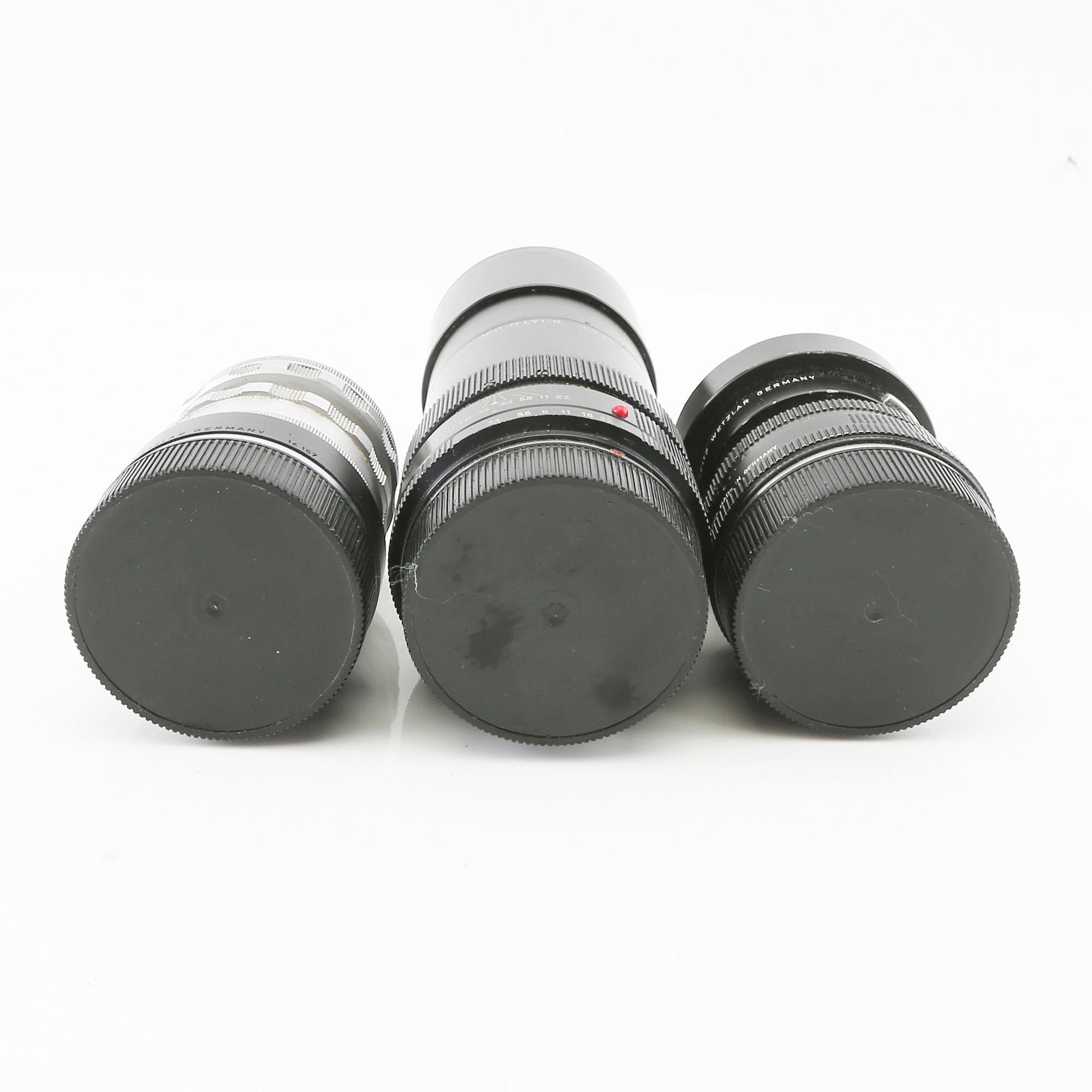 Leica camera with 4 lenses.