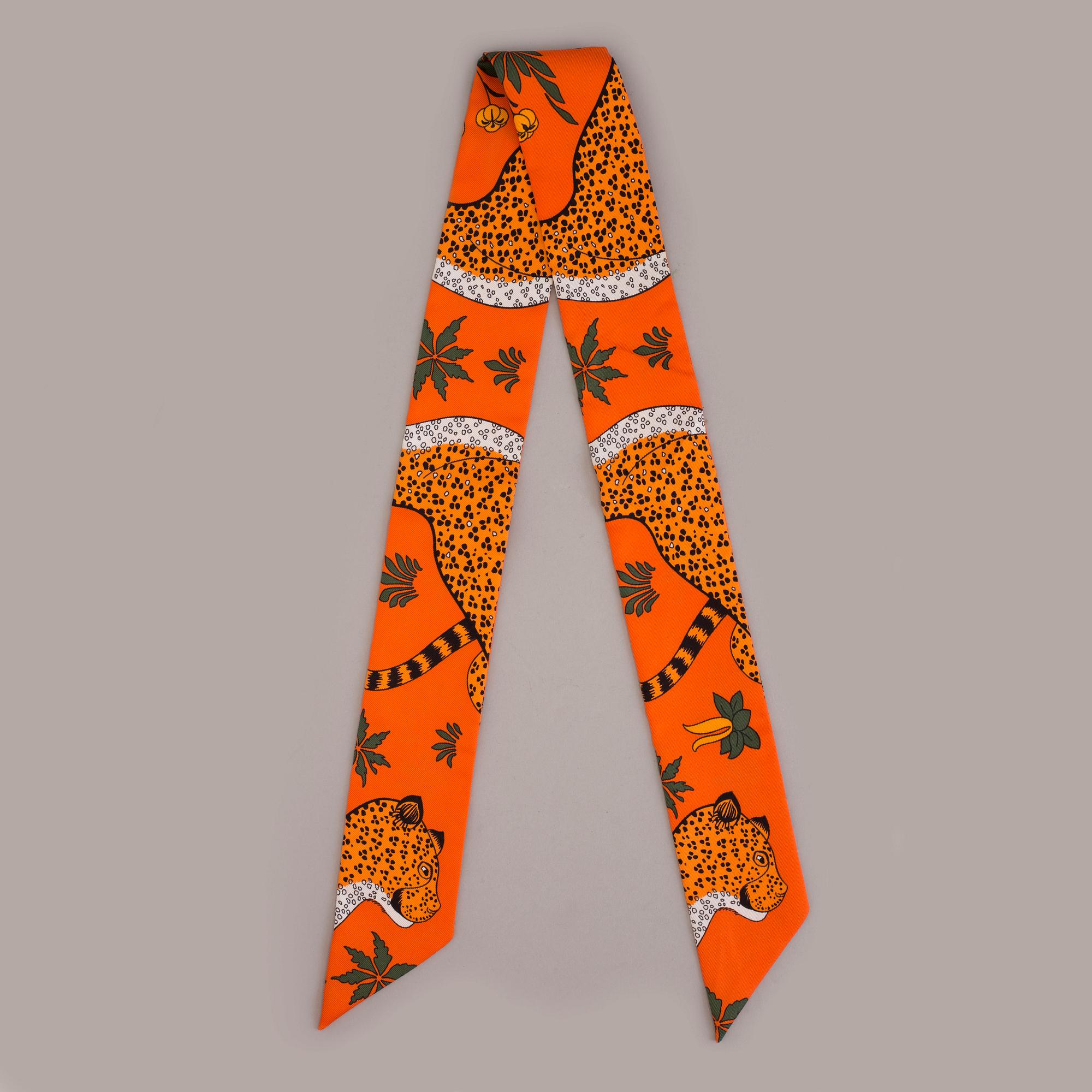 A twirly bandana scarf by Hermès.