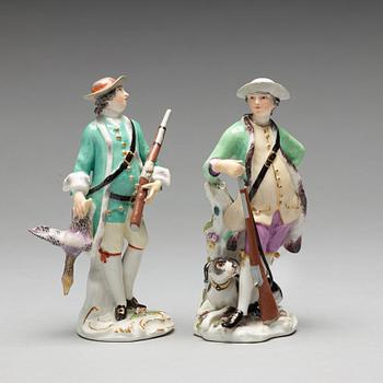 Two Meissen porcelain figures of huntsmen, 18th Century.