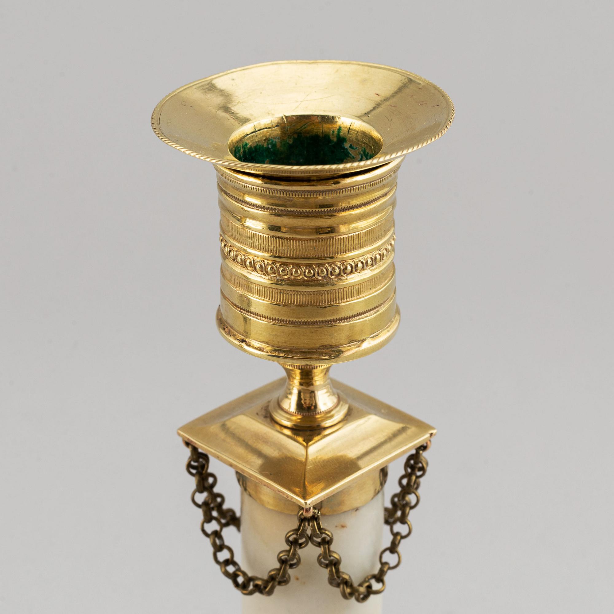 A pair of late-gustavian candlesticks, around year 1800.