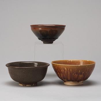 A group of three brown glazed bowls, China, 20th Century.