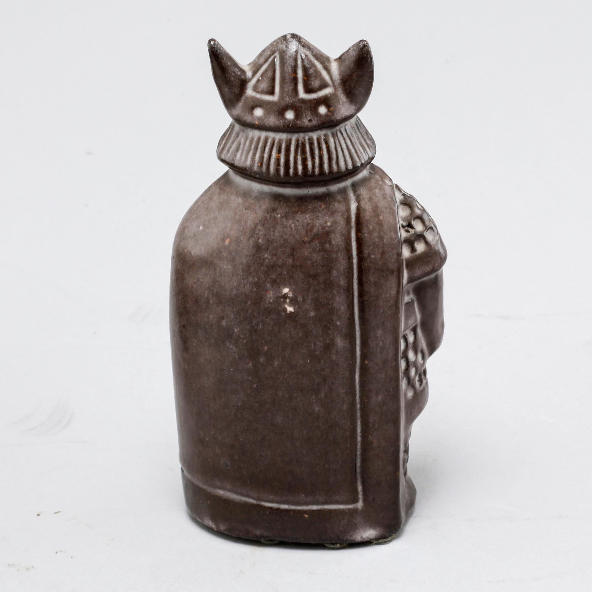 Eight stoneware figurines by Uppsala-Ekeby, from the latter half of the 20th century.
