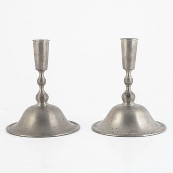 Firma Svenskt Tenn, a pair of pewter candlesticks model "76", Stockholm 1930.