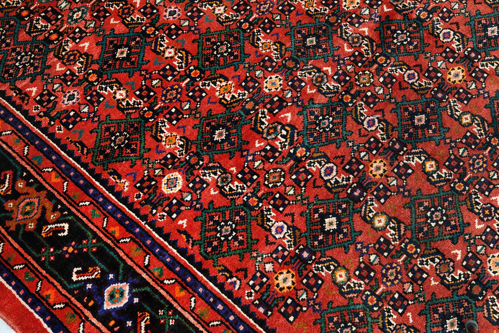A Hosseinabad carpet,, ca 310 x 210 cm.