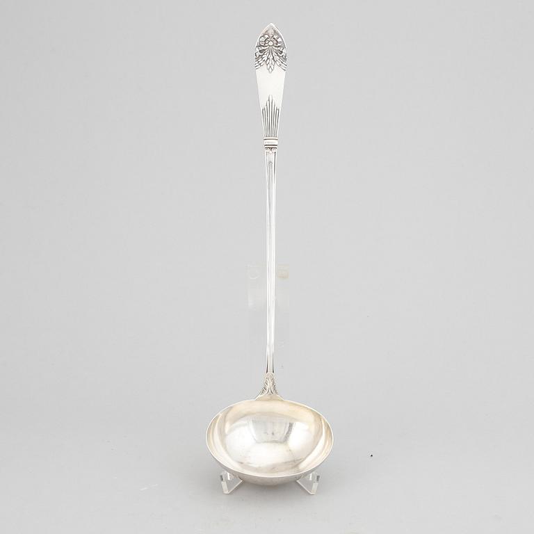 A Swedish silver "Empire" soup ladle, maker's mark Carl Winnerstrand, Stockholm, 1908.