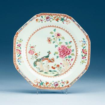 A set of three famille rose 'double peacock' dinner plates, Qing dynasty, Qianlong (1736-95).