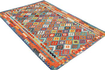 A Kilim carpet, c. 297 x 197 cm.