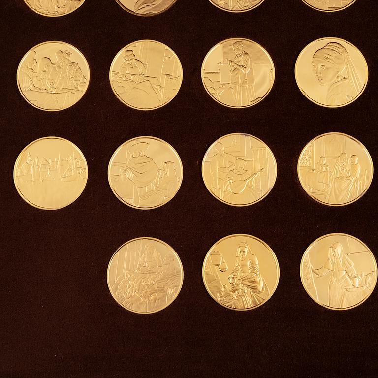 Silver Gilt Coins with motifs after Jan Vermeer, Franklin Mint (31 pieces).