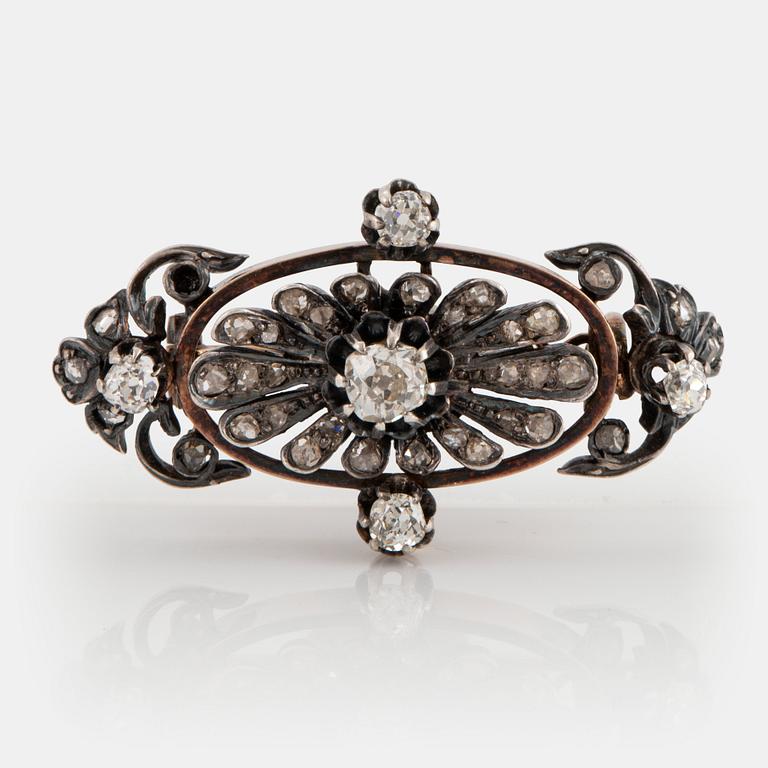 Brosch 18K guld och silver med gammal- och rosenslipade diamanter.