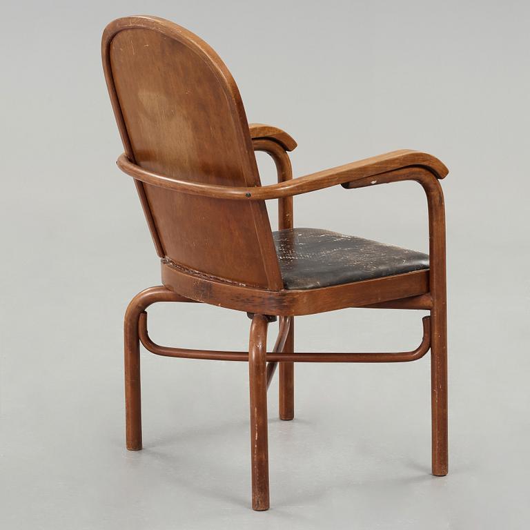 Sigurd Lewerentz, a stained beech and black leather armchair, Gemla, Sweden circa 1932.