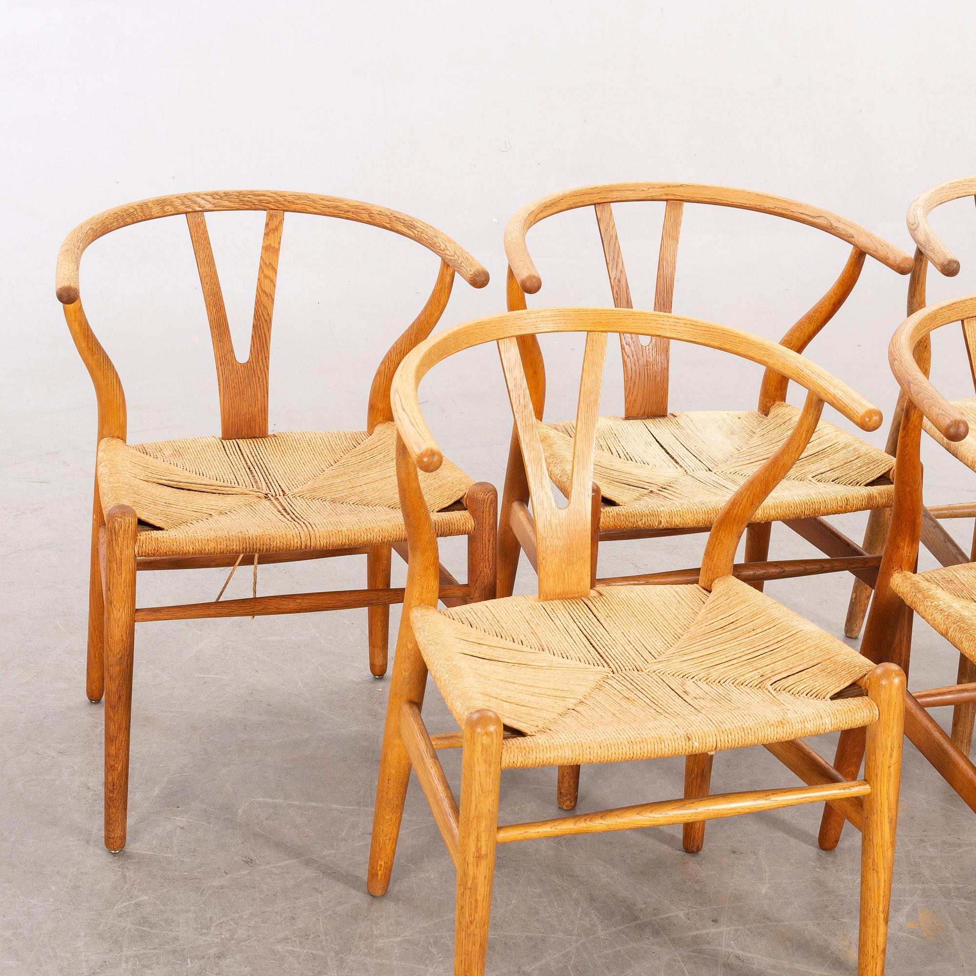 Hans J Wegner, five CH 24 chairs  Carl Hansen & Son, Odense, Denmark.
