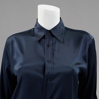 Two cardigans and a silkblouse by Ralph Lauren.