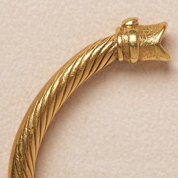 A Greco-Roman style presumably modern gold bracelet.