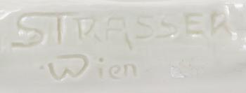 An Amphora porcelain figurine 2882, impressed mark Strasser Wien.