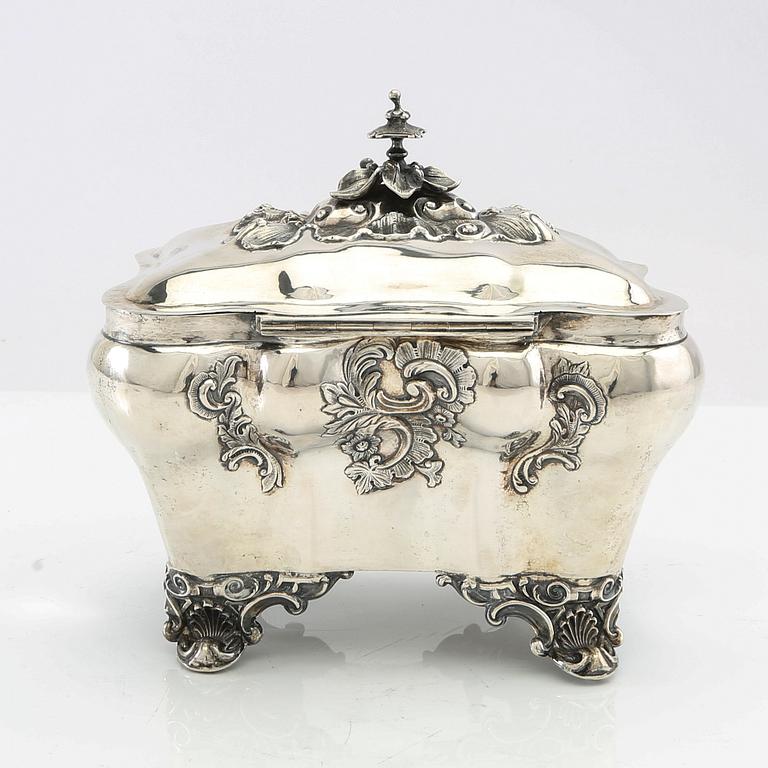 Christian Hammer sugar box with key, silver, Stockholm 1858, Neo-Rococo.