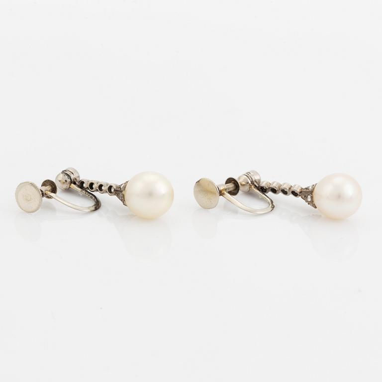 Old cut diamond and pearl earrings.