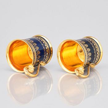 A pair of Sèvres cups with stands, 19th Century.