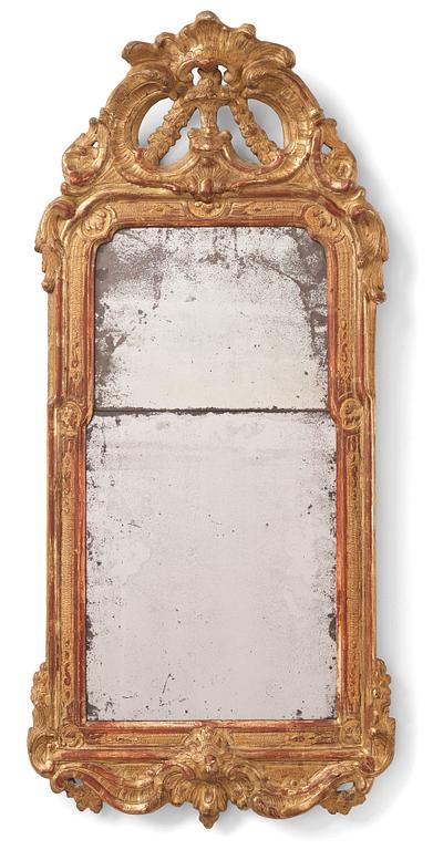 A Rococo giltwood mirror by J. Åkerblad  (master in Stockholm 1758-99), 1775.