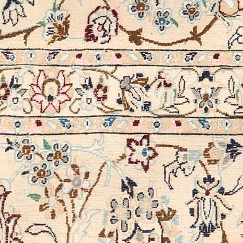 A carpet, Nain, part silk s.k 9LAA. Circa 376 x 249 cm.
