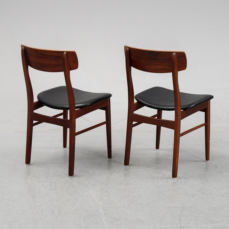 A dining table and six chairs by Henning Kjaernulf, Vejle, second half of the 20th Century.