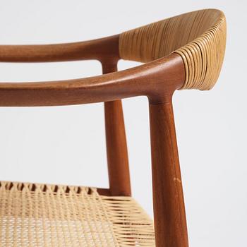 Hans J. Wegner, a pair of teak and rattan 'The Chair', JH-503, Johannes Hansen, Denmark 1950s.