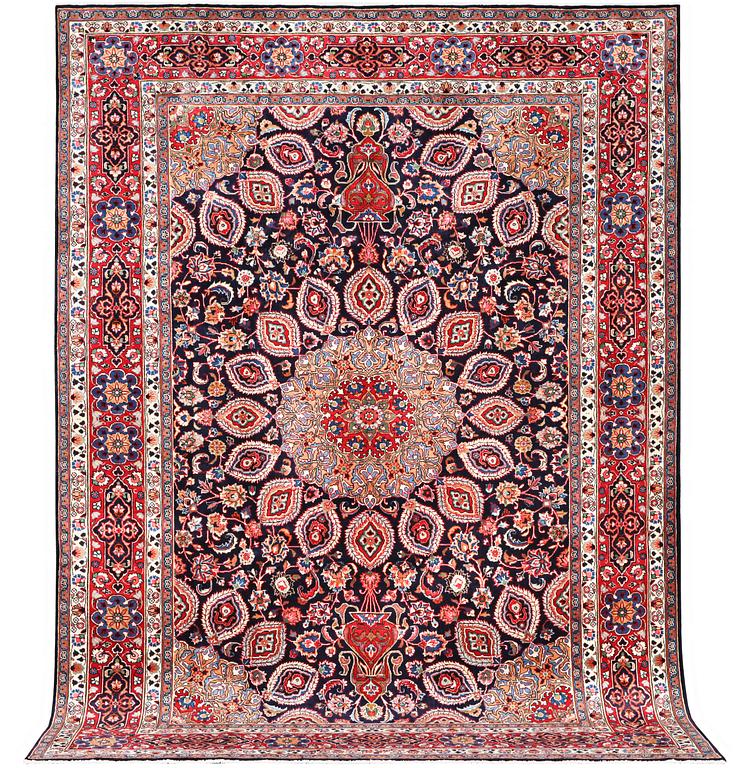 A Meshed carpet, c. 352 x 255 cm.