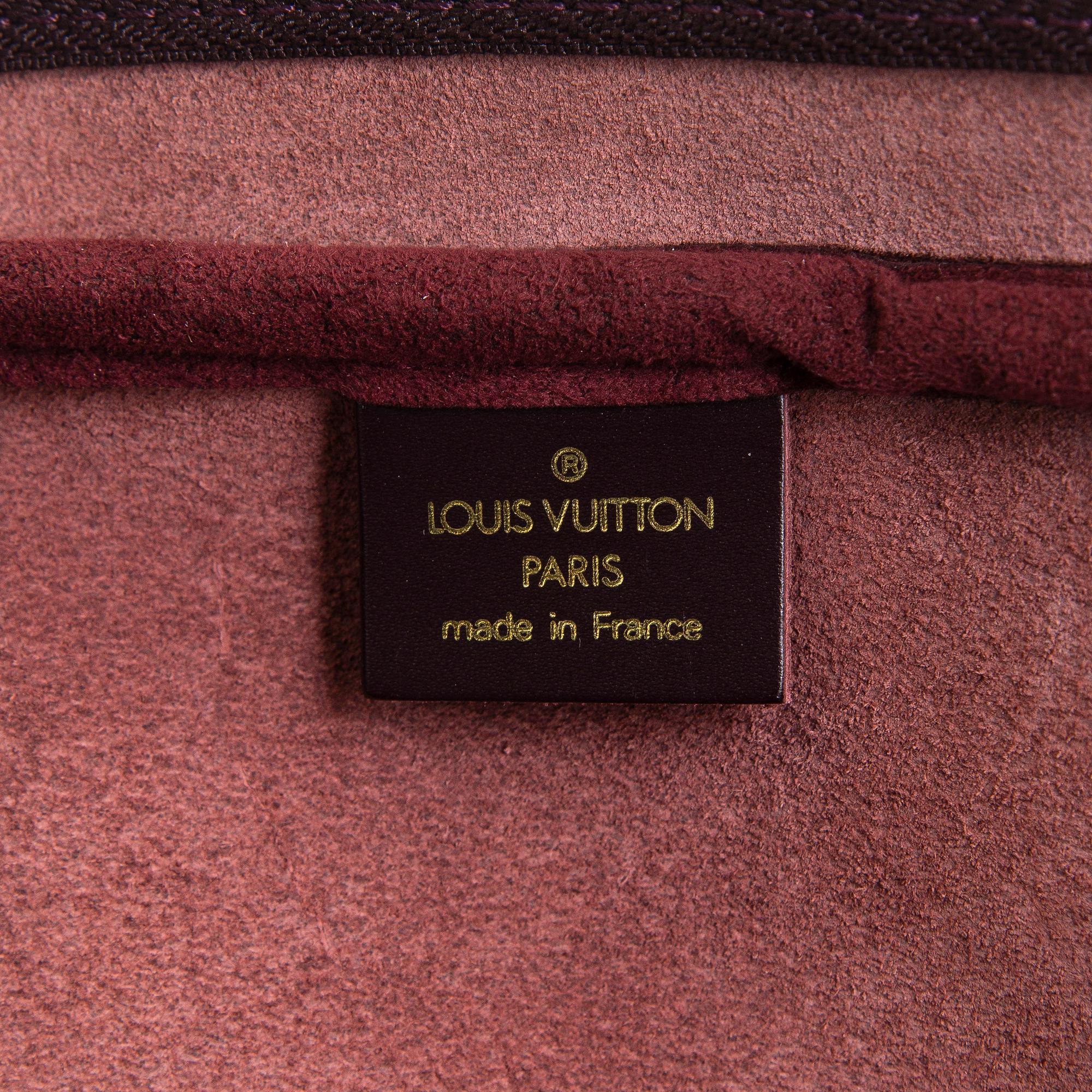 Louis Vuitton, a 'Taiga Kendall PM' weekend bag.